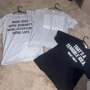 three t-shirts. all with images on the front and a plain backside.